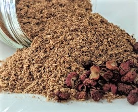 Sichuan Seasoning ~ Certified Organic A jar of Sichuan Seasoning ~ Certified Organic on a white plate.